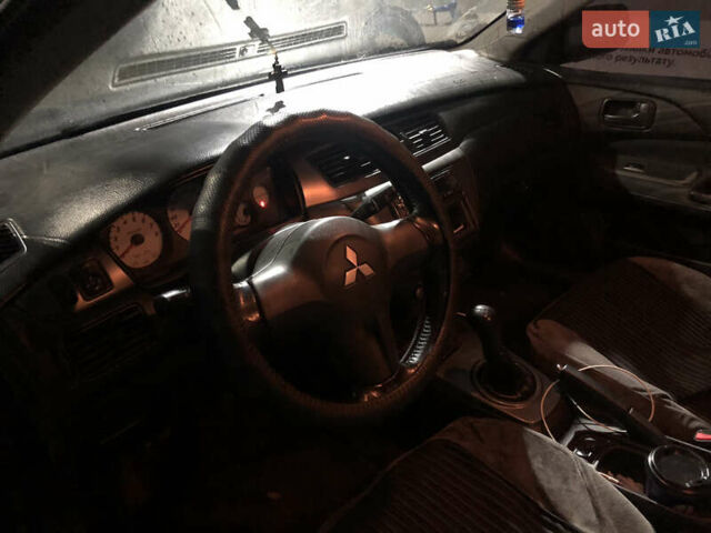 Чорний Міцубісі Lancer, об'ємом двигуна 1.6 л та пробігом 280 тис. км за 3800 $, фото 11 на Automoto.ua