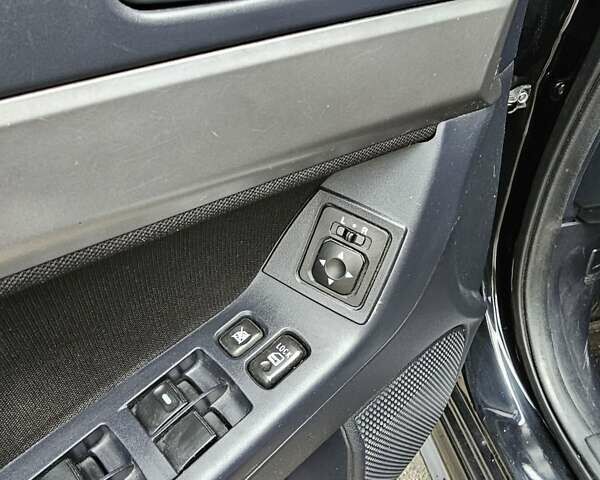 Міцубісі Lancer 2007 у Києві на Automoto.ua Чорний Міцубісі Lancer, об'ємом двигуна 2 л та пробігом 115 тис. км за 5000 $, фото 25 на Automoto.ua