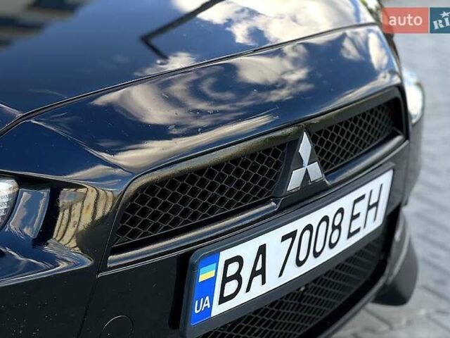 Черный Мицубиси Лансер, объемом двигателя 2 л и пробегом 205 тыс. км за 6500 $, фото 10 на Automoto.ua