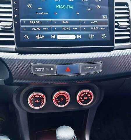 Черный Мицубиси Лансер, объемом двигателя 2 л и пробегом 230 тыс. км за 7100 $, фото 11 на Automoto.ua