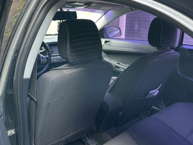 Чорний Міцубісі Lancer, об'ємом двигуна 2 л та пробігом 175 тис. км за 6500 $, фото 16 на Automoto.ua