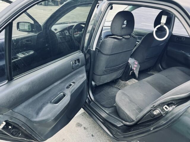 Чорний Міцубісі Lancer, об'ємом двигуна 1.6 л та пробігом 228 тис. км за 3300 $, фото 8 на Automoto.ua