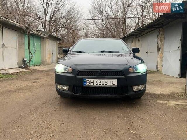 Чорний Міцубісі Lancer, об'ємом двигуна 2 л та пробігом 216 тис. км за 6200 $, фото 7 на Automoto.ua