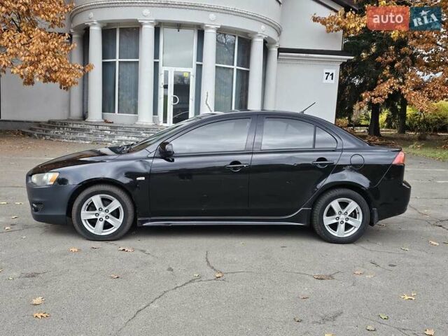 Міцубісі Lancer 2007 у Києві на Automoto.ua Чорний Міцубісі Lancer, об'ємом двигуна 2 л та пробігом 115 тис. км за 5000 $, фото 1 на Automoto.ua