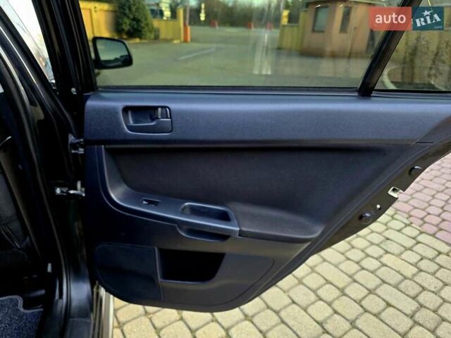 Чорний Міцубісі Lancer, об'ємом двигуна 2 л та пробігом 260 тис. км за 6555 $, фото 41 на Automoto.ua