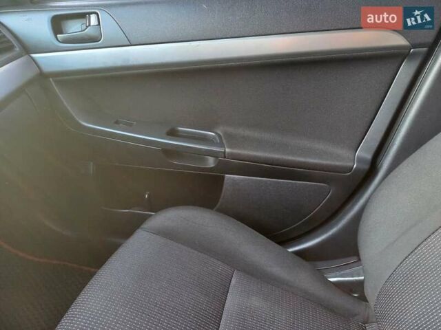 Чорний Міцубісі Lancer, об'ємом двигуна 1.5 л та пробігом 242 тис. км за 5550 $, фото 40 на Automoto.ua
