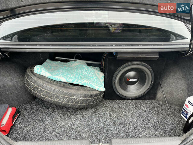 Чорний Міцубісі Lancer, об'ємом двигуна 1.6 л та пробігом 212 тис. км за 4700 $, фото 15 на Automoto.ua