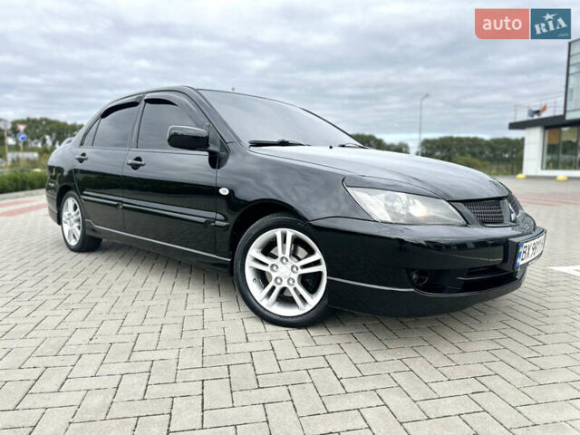 Чорний Міцубісі Lancer, об'ємом двигуна 2 л та пробігом 275 тис. км за 5300 $, фото 2 на Automoto.ua