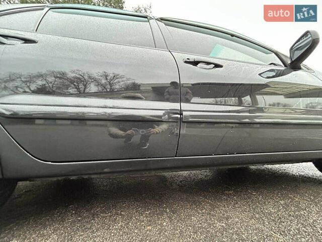 Черный Мицубиси Лансер, объемом двигателя 1.58 л и пробегом 254 тыс. км за 5000 $, фото 8 на Automoto.ua