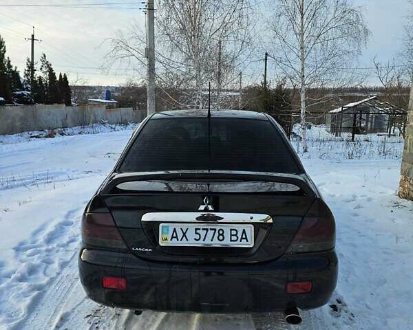 Чорний Міцубісі Lancer, об'ємом двигуна 1.6 л та пробігом 240 тис. км за 3500 $, фото 4 на Automoto.ua