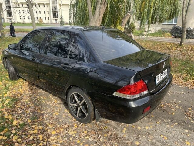 Міцубісі Lancer 2007 у Каневе на Automoto.ua Чорний Міцубісі Lancer, об'ємом двигуна 1.6 л та пробігом 310 тис. км за 4100 $, фото 3 на Automoto.ua