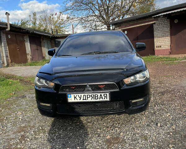 Чорний Міцубісі Lancer, об'ємом двигуна 1.5 л та пробігом 150 тис. км за 6500 $, фото 1 на Automoto.ua