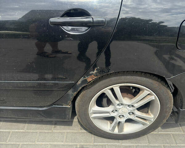 Чорний Міцубісі Lancer, об'ємом двигуна 2 л та пробігом 210 тис. км за 5500 $, фото 42 на Automoto.ua