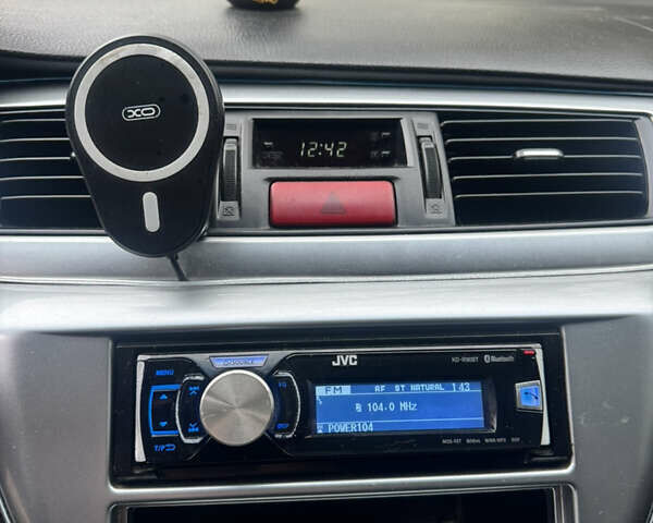 Чорний Міцубісі Lancer, об'ємом двигуна 2 л та пробігом 210 тис. км за 5500 $, фото 34 на Automoto.ua