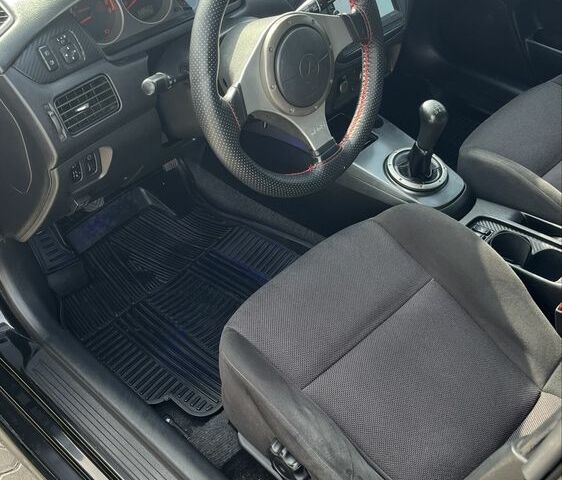 Черный Мицубиси Лансер, объемом двигателя 2 л и пробегом 224 тыс. км за 5800 $, фото 5 на Automoto.ua