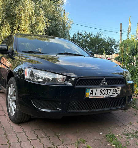 Черный Мицубиси Лансер, объемом двигателя 1.5 л и пробегом 111 тыс. км за 7500 $, фото 6 на Automoto.ua