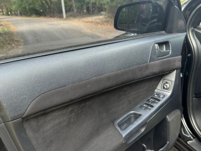 Черный Мицубиси Лансер, объемом двигателя 2 л и пробегом 280 тыс. км за 6800 $, фото 7 на Automoto.ua