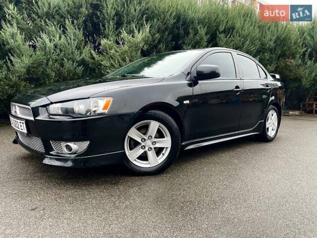Чорний Міцубісі Lancer, об'ємом двигуна 2 л та пробігом 69 тис. км за 5700 $, фото 3 на Automoto.ua