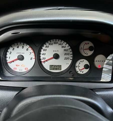 Чорний Міцубісі Lancer, об'ємом двигуна 1.58 л та пробігом 135 тис. км за 4100 $, фото 9 на Automoto.ua