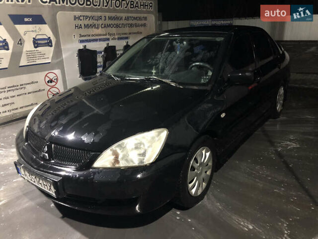 Чорний Міцубісі Lancer, об'ємом двигуна 1.6 л та пробігом 280 тис. км за 3800 $, фото 5 на Automoto.ua