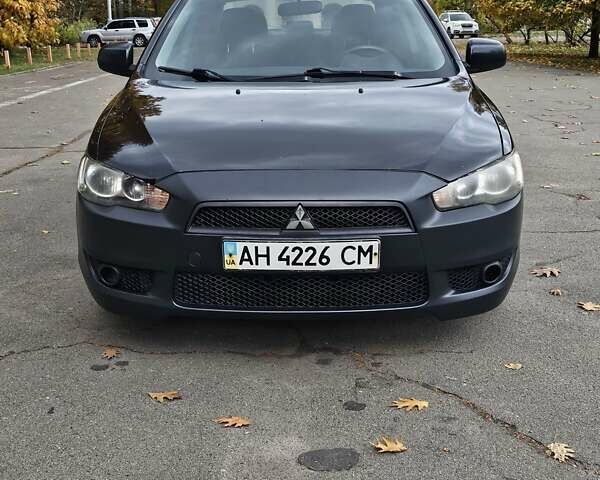 Міцубісі Lancer 2007 у Києві на Automoto.ua Чорний Міцубісі Lancer, об'ємом двигуна 2 л та пробігом 115 тис. км за 5000 $, фото 8 на Automoto.ua