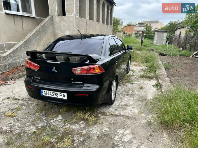 Чорний Міцубісі Lancer, об'ємом двигуна 2 л та пробігом 200 тис. км за 6900 $, фото 4 на Automoto.ua