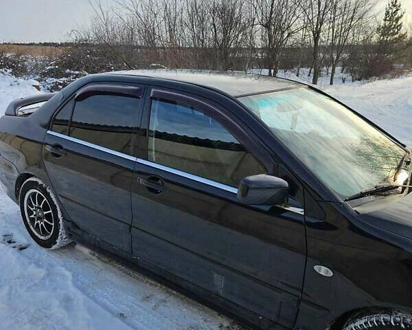 Чорний Міцубісі Lancer, об'ємом двигуна 1.6 л та пробігом 240 тис. км за 3500 $, фото 2 на Automoto.ua
