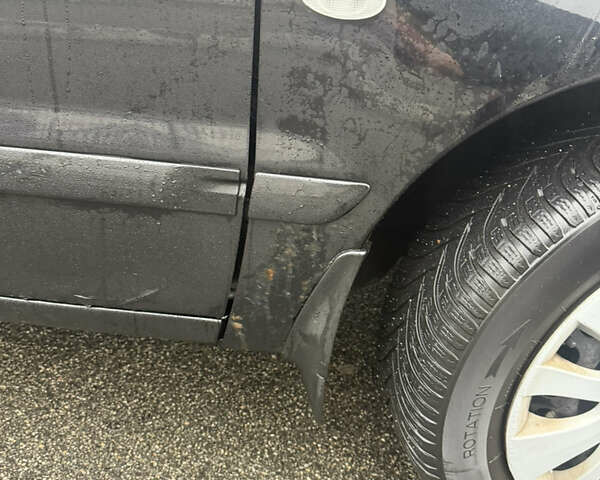 Чорний Міцубісі Lancer, об'ємом двигуна 1.58 л та пробігом 256 тис. км за 3700 $, фото 40 на Automoto.ua