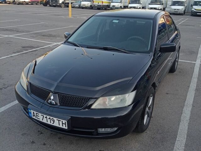 Черный Мицубиси Лансер, объемом двигателя 1.6 л и пробегом 301 тыс. км за 4300 $, фото 9 на Automoto.ua