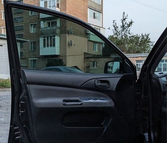 Черный Мицубиси Лансер, объемом двигателя 1.6 л и пробегом 226 тыс. км за 4800 $, фото 10 на Automoto.ua