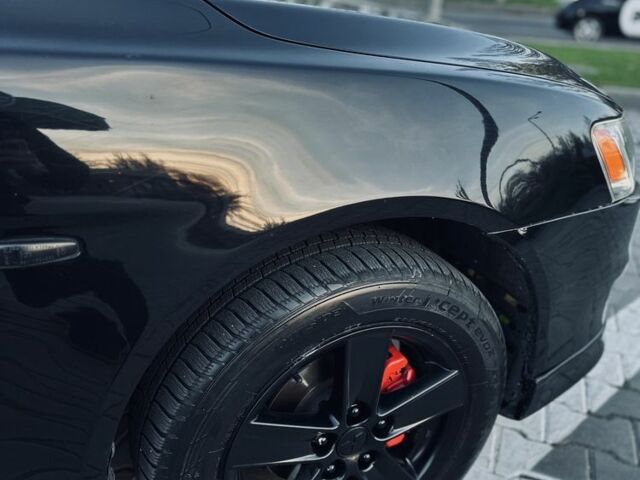 Черный Мицубиси Лансер, объемом двигателя 2 л и пробегом 242 тыс. км за 6200 $, фото 7 на Automoto.ua