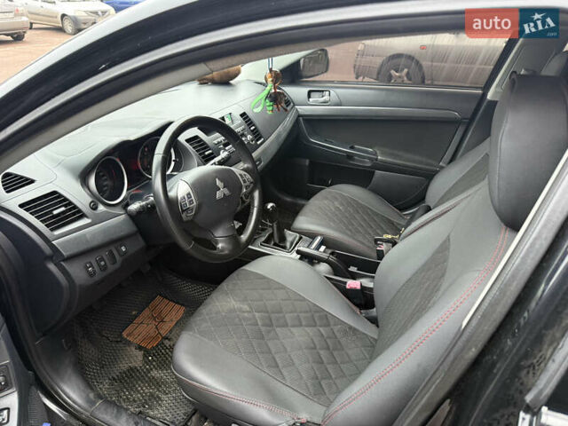 Чорний Міцубісі Lancer, об'ємом двигуна 2 л та пробігом 281 тис. км за 6000 $, фото 12 на Automoto.ua