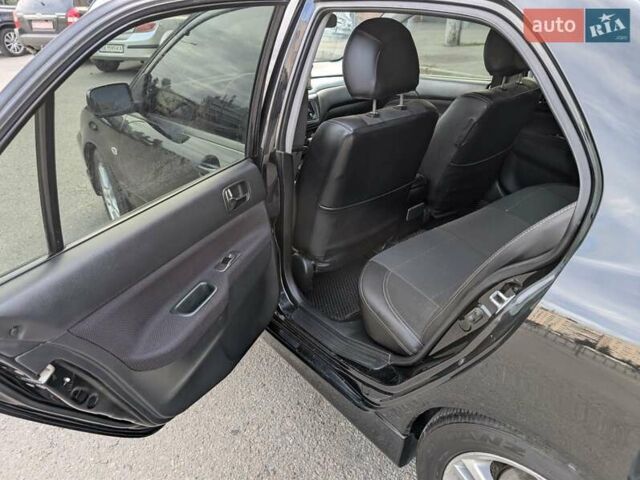 Чорний Міцубісі Lancer, об'ємом двигуна 2 л та пробігом 152 тис. км за 5500 $, фото 13 на Automoto.ua