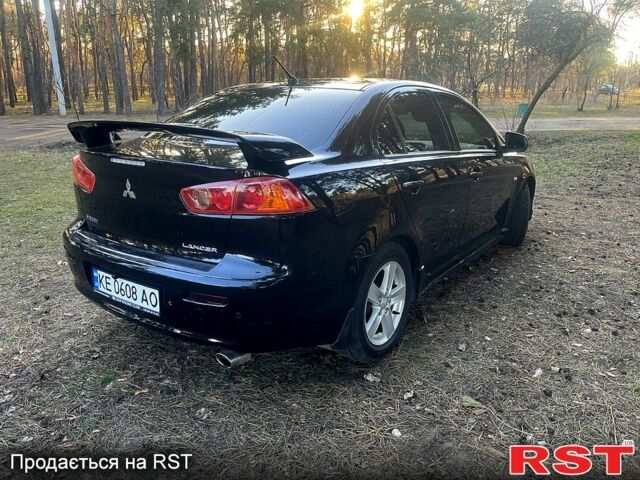 Чорний Міцубісі Lancer, об'ємом двигуна 2 л та пробігом 190 тис. км за 6800 $, фото 4 на Automoto.ua
