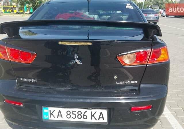 Чорний Міцубісі Lancer, об'ємом двигуна 2 л та пробігом 194 тис. км за 6500 $, фото 16 на Automoto.ua