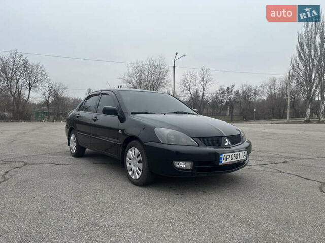 Чорний Міцубісі Lancer, об'ємом двигуна 1.58 л та пробігом 173 тис. км за 5099 $, фото 10 на Automoto.ua