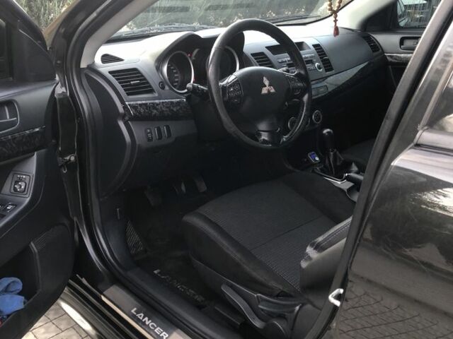 Чорний Міцубісі Lancer, об'ємом двигуна 2 л та пробігом 194 тис. км за 5950 $, фото 4 на Automoto.ua