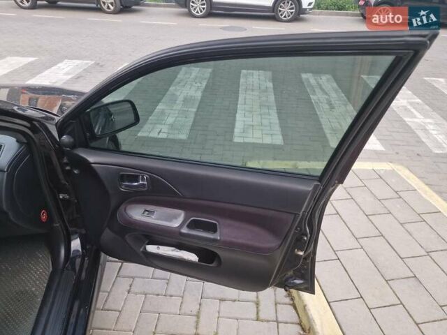 Чорний Міцубісі Lancer, об'ємом двигуна 2 л та пробігом 272 тис. км за 4750 $, фото 21 на Automoto.ua