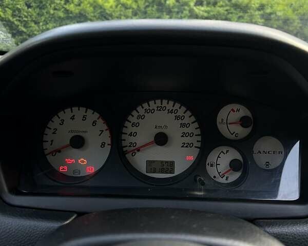 Черный Мицубиси Лансер, объемом двигателя 1.6 л и пробегом 131 тыс. км за 4350 $, фото 14 на Automoto.ua
