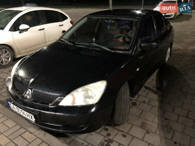 Чорний Міцубісі Lancer, об'ємом двигуна 1.6 л та пробігом 280 тис. км за 3800 $, фото 18 на Automoto.ua