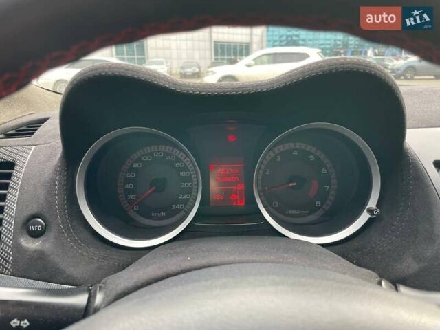 Черный Мицубиси Лансер, объемом двигателя 2 л и пробегом 246 тыс. км за 7500 $, фото 18 на Automoto.ua