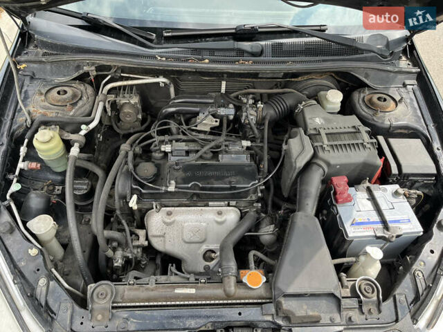 Чорний Міцубісі Lancer, об'ємом двигуна 1.59 л та пробігом 150 тис. км за 5500 $, фото 3 на Automoto.ua