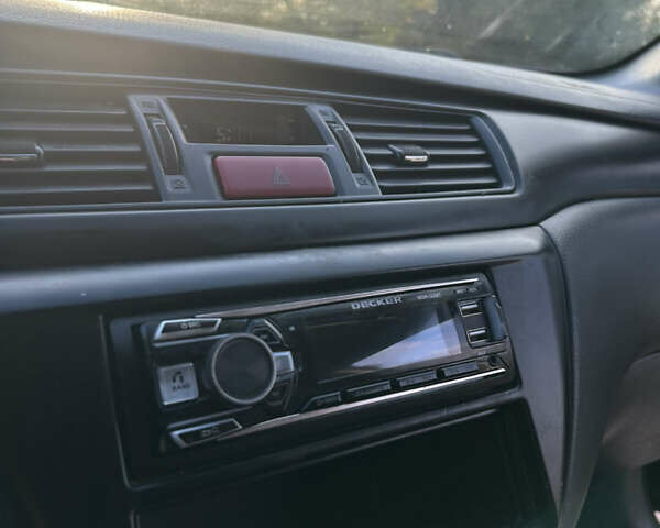 Чорний Міцубісі Lancer, об'ємом двигуна 2 л та пробігом 280 тис. км за 4600 $, фото 38 на Automoto.ua