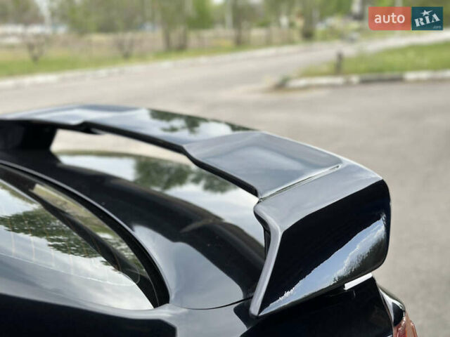 Чорний Міцубісі Lancer, об'ємом двигуна 2 л та пробігом 192 тис. км за 6500 $, фото 32 на Automoto.ua