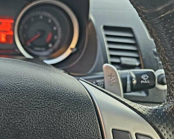 Чорний Міцубісі Lancer, об'ємом двигуна 2 л та пробігом 260 тис. км за 6555 $, фото 25 на Automoto.ua