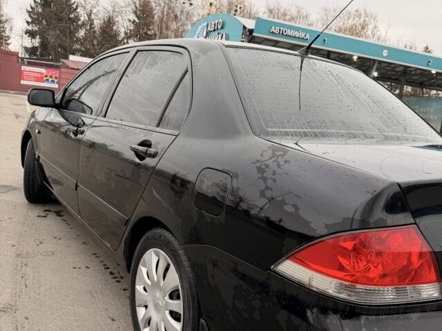 Черный Мицубиси Лансер, объемом двигателя 0 л и пробегом 240 тыс. км за 3300 $, фото 2 на Automoto.ua