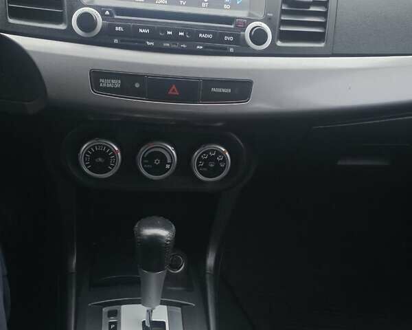 Черный Мицубиси Лансер, объемом двигателя 2 л и пробегом 116 тыс. км за 7200 $, фото 10 на Automoto.ua