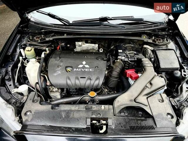 Чорний Міцубісі Lancer, об'ємом двигуна 2 л та пробігом 69 тис. км за 6200 $, фото 11 на Automoto.ua