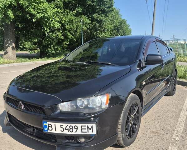 Чорний Міцубісі Lancer, об'ємом двигуна 2 л та пробігом 243 тис. км за 6600 $, фото 2 на Automoto.ua