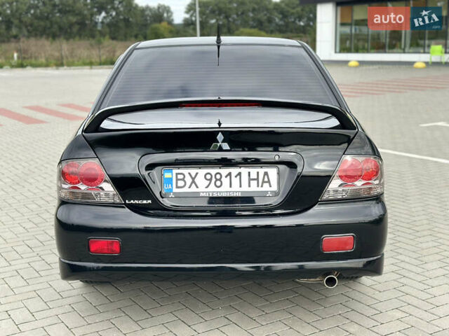 Чорний Міцубісі Lancer, об'ємом двигуна 2 л та пробігом 275 тис. км за 5300 $, фото 24 на Automoto.ua
